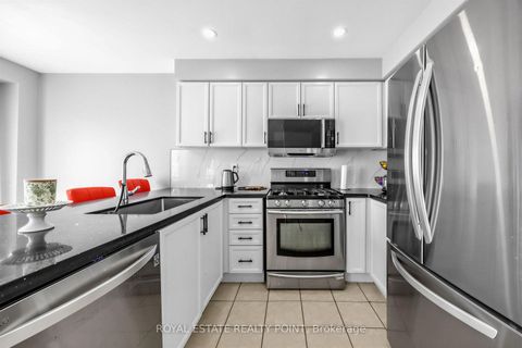 Photo 7 at 141 Raponi Circle, Rouge E11, Toronto