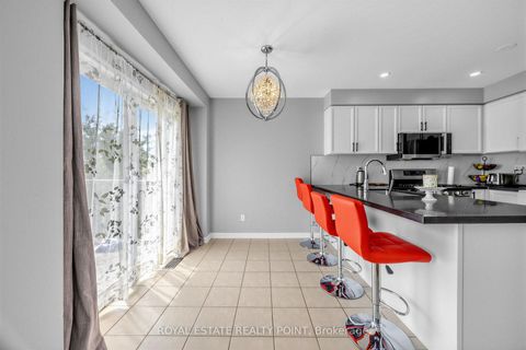 Photo 10 at 141 Raponi Circle, Rouge E11, Toronto