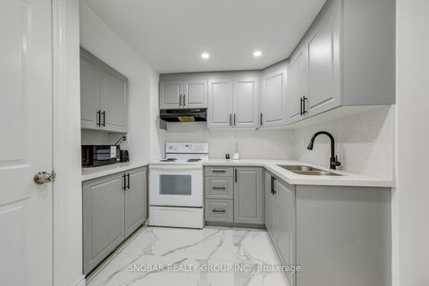 Photo 26 at 99 Jeffcoat Drive, Clairville, Toronto