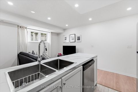 Photo 1 at 3 - 157 Isaac Devins Boulevard, Pelmo Park W5, Toronto