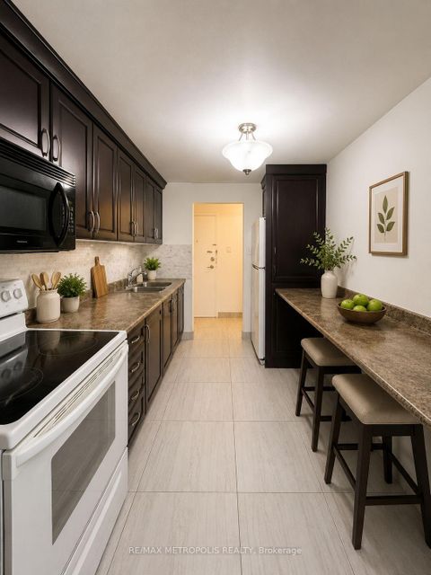 Photo 2 at 202 - 1445 Wilson Avenue, CFB, Toronto