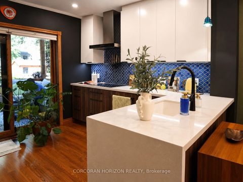 Photo 11 at 402 Rhodes Avenue, Coxwell, Toronto