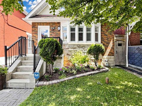 Photo 2 at 67 Barrington Avenue, Crescent Town, Toronto
