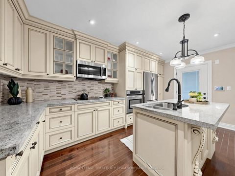 Photo 10 at 67 Barrington Avenue, Crescent Town, Toronto
