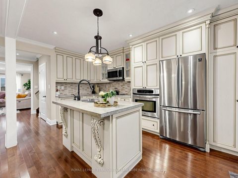Photo 11 at 67 Barrington Avenue, Crescent Town, Toronto