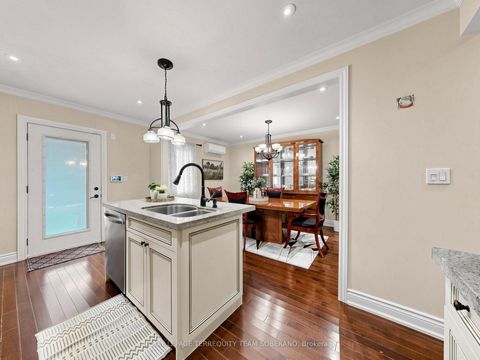 Photo 12 at 67 Barrington Avenue, Crescent Town, Toronto