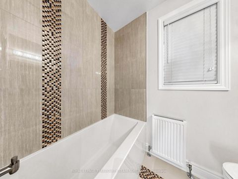Photo 19 at 67 Barrington Avenue, Crescent Town, Toronto