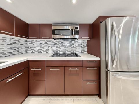 Photo 30 at 67 Barrington Avenue, Crescent Town, Toronto