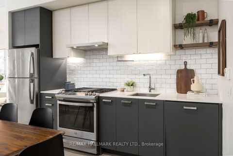 Photo 1 at 403 - 1331 Queen Street E, South Riverdale, Toronto