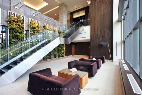 Photo 2 at 303 - 35 Brian Peck Crescent, Thorncliffe Park, Toronto