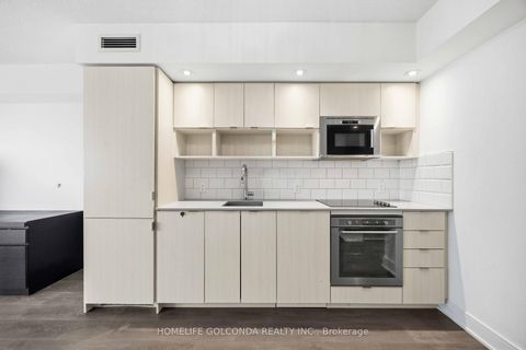 Photo 1 at 703 - 89 McGill Street, Yonge Corridor, Toronto