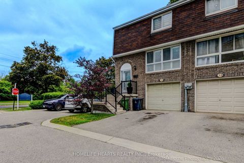 Photo 1 at 32 - 625 Rathburn Road, West Deane, Toronto