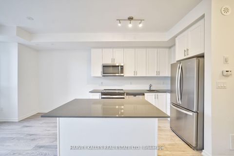 Photo 7 at 21 - 17 Lytham Green Circle, Glenway Estates, Newmarket
