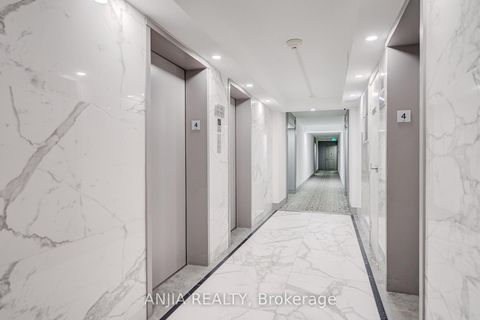 Photo 5 at 401 - 255 Bamburgh Circle, Steeles, Toronto
