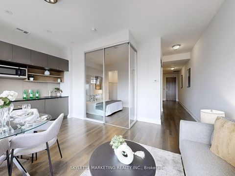 Photo 12 at 1128 - 111 St Clair Avenue W, St. Clair, Toronto