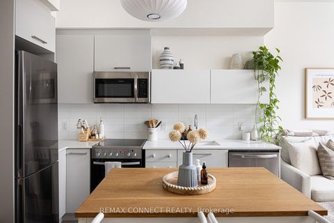 Photo 1 at 107 - 1 Neighbourhood Lane, Queensway, Toronto