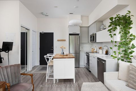 Photo 4 at 107 - 1 Neighbourhood Lane, Queensway, Toronto