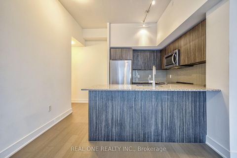 Photo 4 at 231 - 30 Shore Breeze Drive, Mimico, Toronto