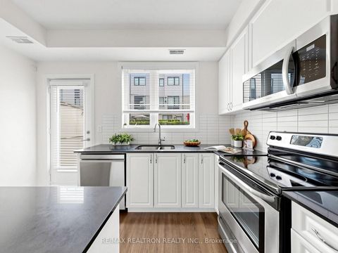 Photo 7 at 6 - 65 Thomas Mullholand Drive, CFB, Toronto