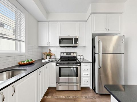 Photo 8 at 6 - 65 Thomas Mullholand Drive, CFB, Toronto