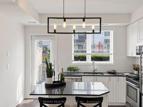 Photo 11 at 6 - 65 Thomas Mullholand Drive, CFB, Toronto