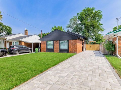 Photo 1 at 23 Denham Road, Dorset Park, Toronto