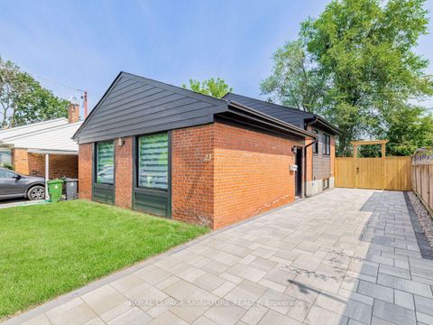 Photo 2 at 23 Denham Road, Dorset Park, Toronto