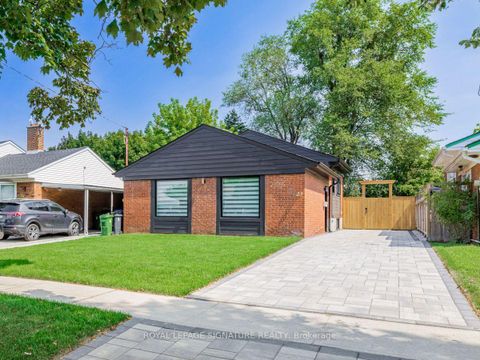 Photo 3 at 23 Denham Road, Dorset Park, Toronto