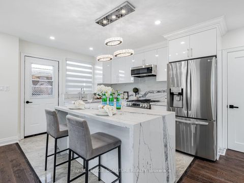 Photo 12 at 23 Denham Road, Dorset Park, Toronto