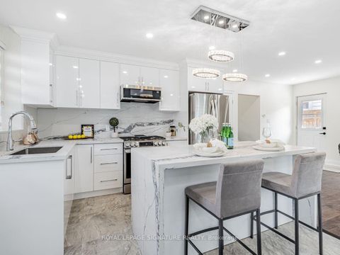 Photo 13 at 23 Denham Road, Dorset Park, Toronto