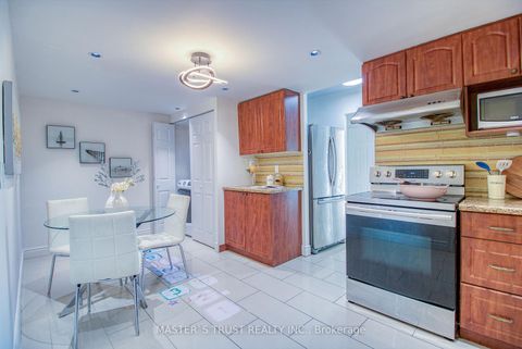 Photo 10 at 607 - 255 Bamburgh Circle W, Steeles, Toronto