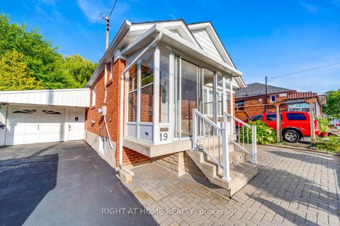 Photo 2 at 19 Martorino Drive, Kennedy Park, Toronto