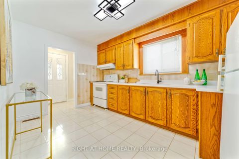 Photo 11 at 19 Martorino Drive, Kennedy Park, Toronto