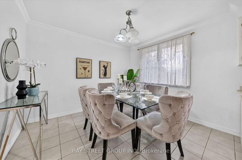 Photo 10 at 95 TINETA Crescent, Malvern West, Toronto