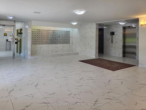 Photo 2 at 1017 - 100 Dundalk Drive, Dorset Park, Toronto