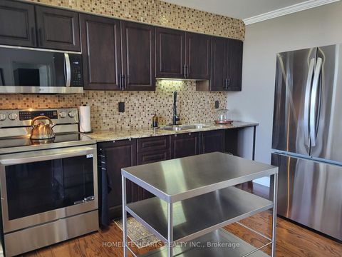 Photo 7 at 1017 - 100 Dundalk Drive, Dorset Park, Toronto