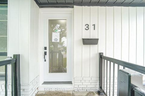 Photo 2 at 31A Laurel Avenue, Kennedy Park, Toronto