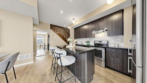 Photo 9 at 107 - 600 Alex Gardner Circle, Aurora Village, Aurora
