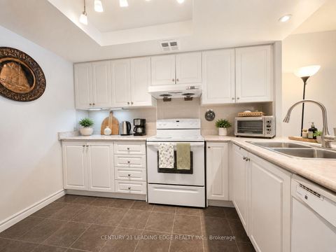 Photo 6 at 310 - 275 Bamburgh Circle, Steeles, Toronto