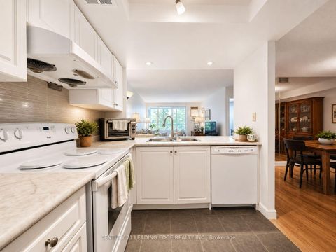 Photo 7 at 310 - 275 Bamburgh Circle, Steeles, Toronto