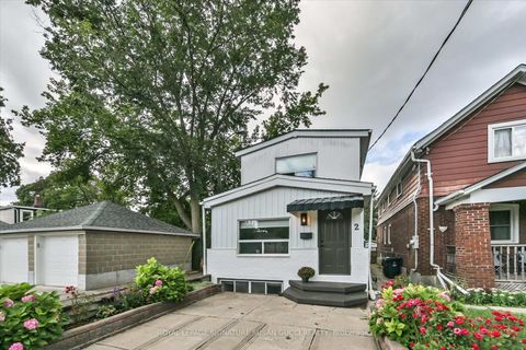 Photo 1 at 2 Sutherland Avenue, Crescent Town, Toronto