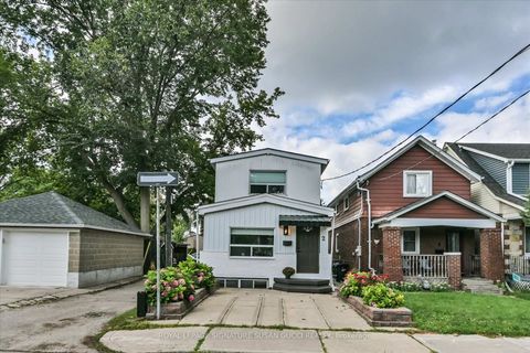 Photo 2 at 2 Sutherland Avenue, Crescent Town, Toronto