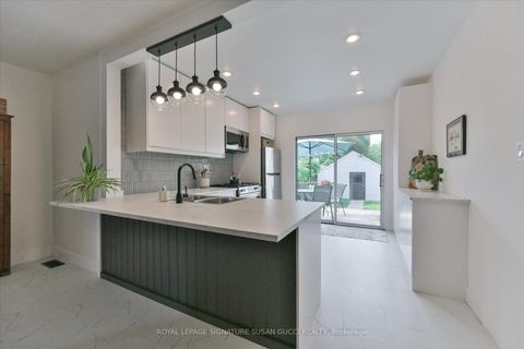 Photo 12 at 2 Sutherland Avenue, Crescent Town, Toronto