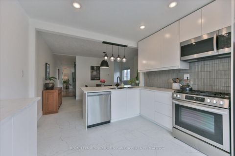 Photo 13 at 2 Sutherland Avenue, Crescent Town, Toronto