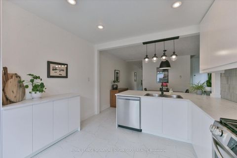 Photo 15 at 2 Sutherland Avenue, Crescent Town, Toronto