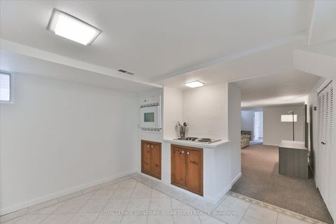 Photo 32 at 2 Sutherland Avenue, Crescent Town, Toronto