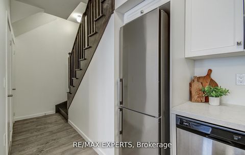 Photo 13 at 61 - 300 Alex Gardner Circle, Aurora Village, Aurora