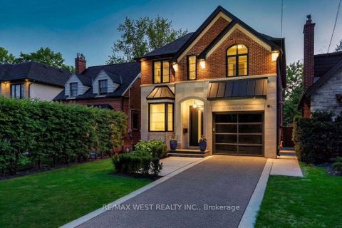 Photo 1 at 64 Thompson Avenue, Queensway, Toronto