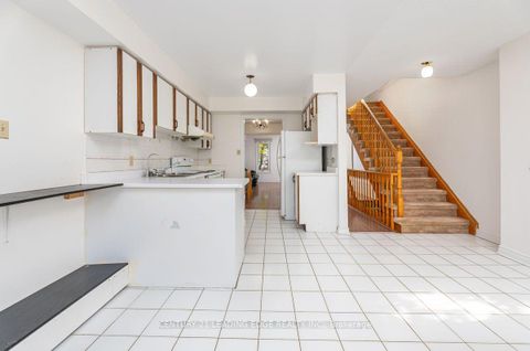 Photo 7 at 1 - 3 Reidmount Avenue, Malvern West, Toronto