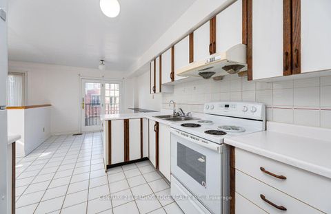 Photo 8 at 1 - 3 Reidmount Avenue, Malvern West, Toronto